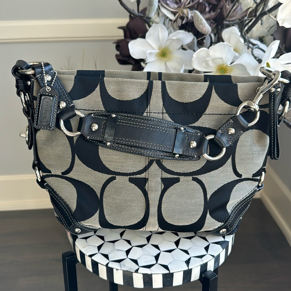 Coach Monogram Shoulder Bag. Black leather with tan canvas.